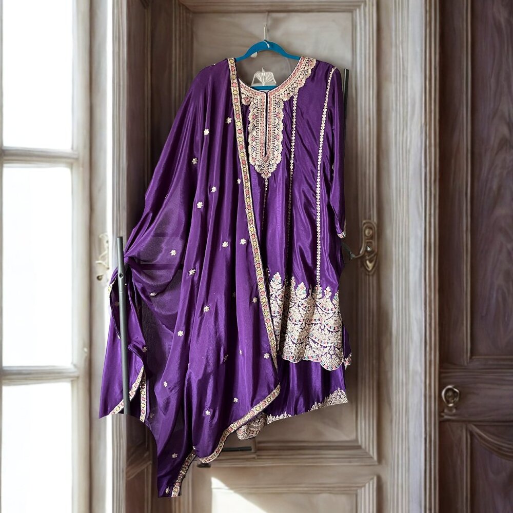 Indian tunic (kameez) and trousers (salwar) and scarf (dupatti)